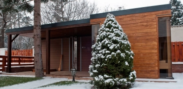 Outdoor sauna house with canopy